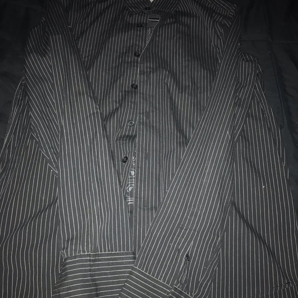 Great condition Pinstripe Long sleeve shirt medium skull on the back shirt.